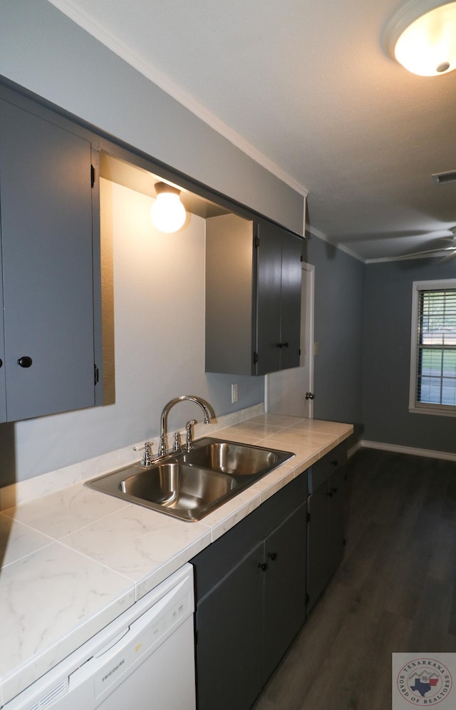 kitchen with sink, dark hardwood / wood-style floors, dishwasher, and gray cabinetry