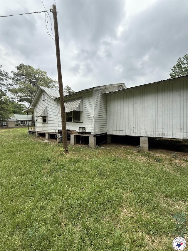5853 Wallace Rd, Texarkana, AR 71854 - view of home's exterior with a yard