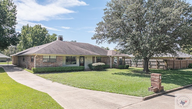 ranch-style house with a front yard