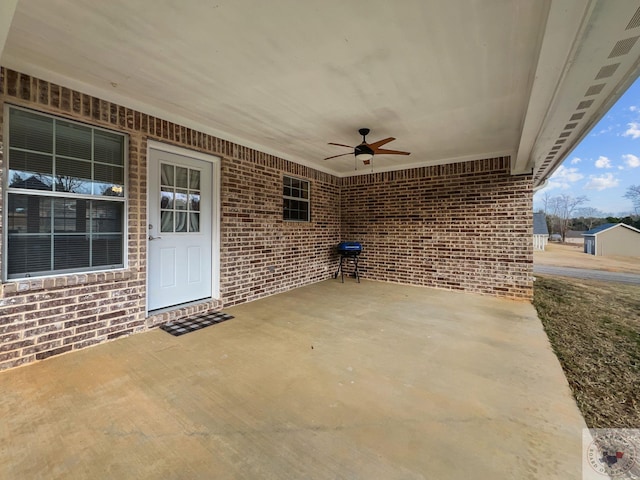 view of patio featuring ceiling fan and area for grilling