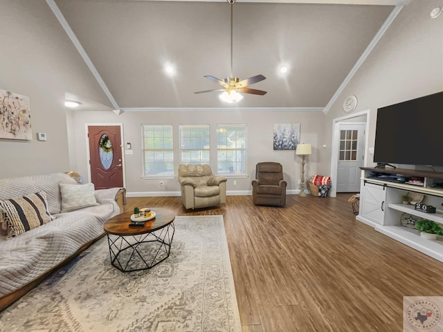 living area featuring ceiling fan, high vaulted ceiling, wood finished floors, baseboards, and ornamental molding