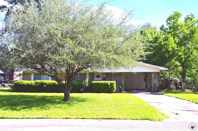 530 Bentley Dr, Nash, TX 75569 - view of front of house featuring a front yard, driveway, and an attached carport