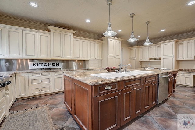 kitchen with an island with sink, hanging light fixtures, light stone countertops, a sink, and recessed lighting