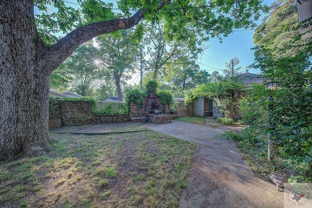 view of yard with a patio area and fence