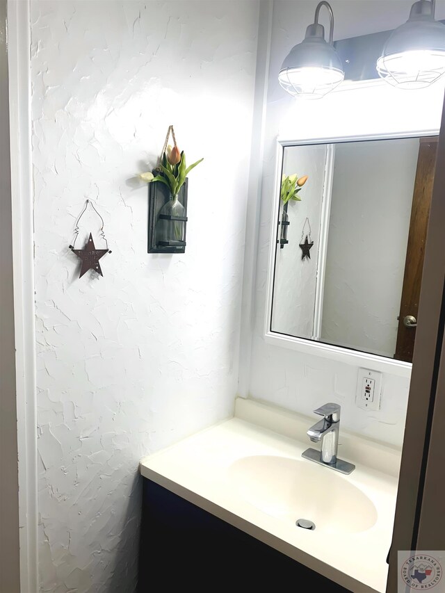 bathroom featuring vanity