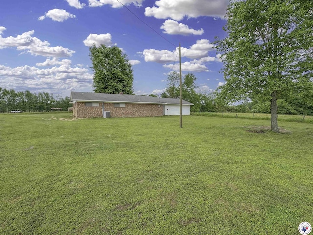 view of yard featuring a garage