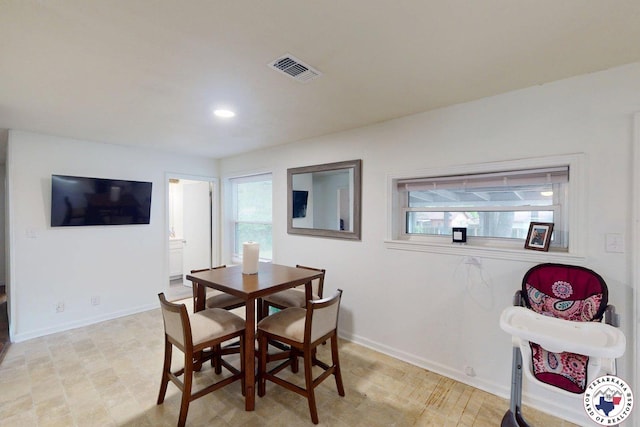 1205 W 40th St, Texarkana, TX 75501 - dining room with plenty of natural light, recessed lighting, and baseboards