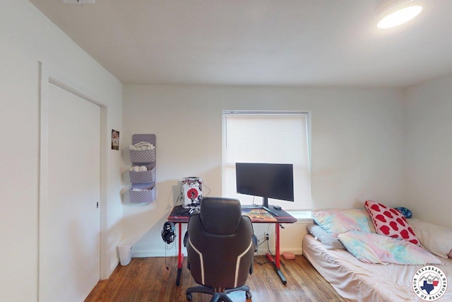 1205 W 40th St, Texarkana, TX 75501 - home office featuring plenty of natural light, wood finished floors, and baseboards