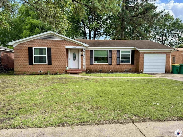 1205 W 40th St, Texarkana, TX 75501 - ranch-style home with a garage, crawl space, brick siding, and a front yard