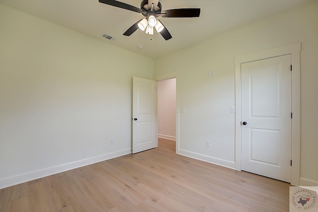 unfurnished bedroom with light hardwood / wood-style flooring and ceiling fan