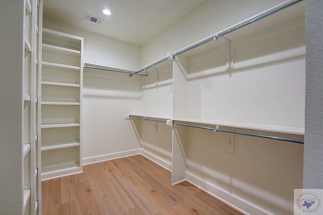 walk in closet featuring light wood-type flooring