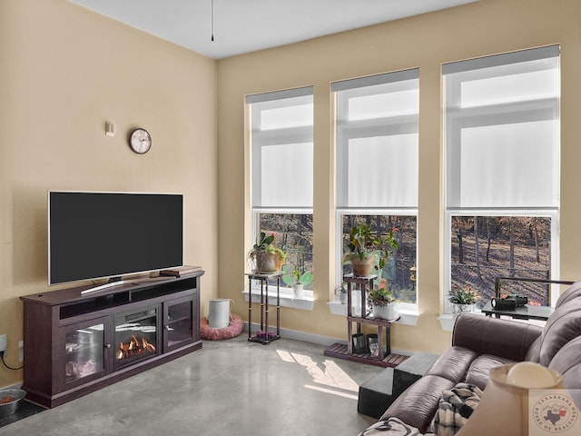 living room with concrete flooring