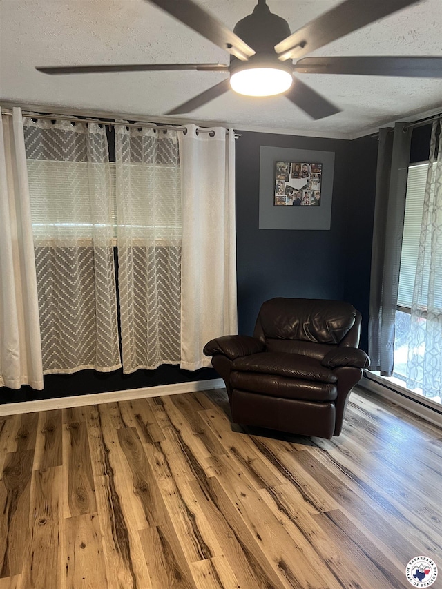 3609 Belmont Ave, Texarkana, AR 71854 - sitting room featuring a ceiling fan and wood finished floors