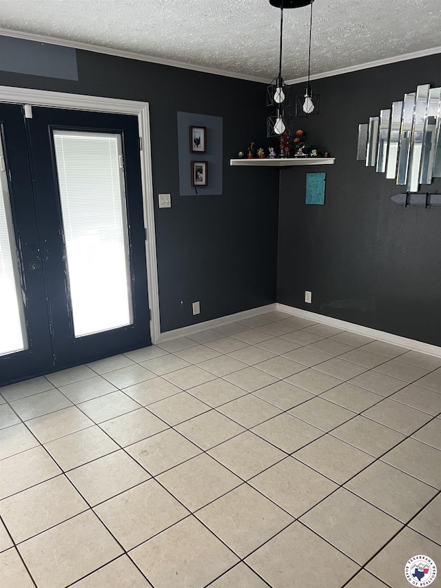 3609 Belmont Ave, Texarkana, AR 71854 - unfurnished dining area with a textured ceiling, ornamental molding, and light tile patterned floors