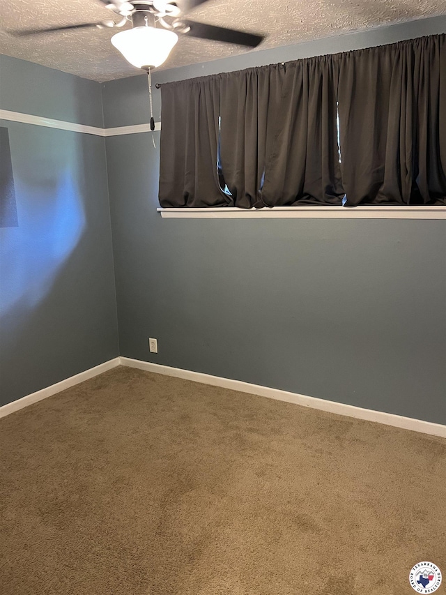 3609 Belmont Ave, Texarkana, AR 71854 - carpeted empty room with a ceiling fan and a textured ceiling
