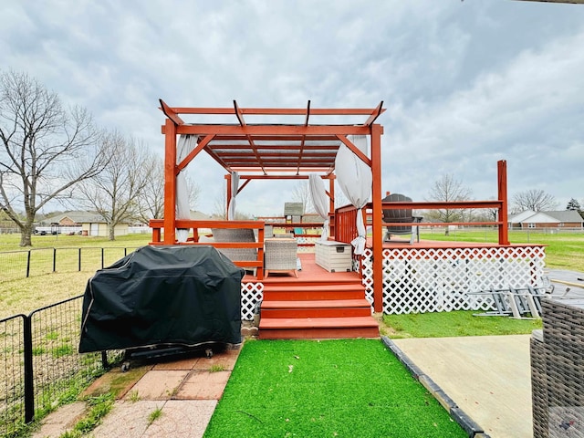 exterior space featuring fence, a deck, and a pergola