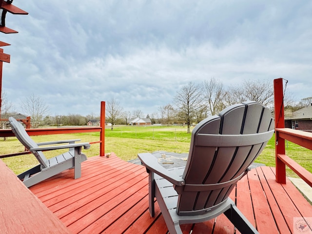 deck featuring a lawn