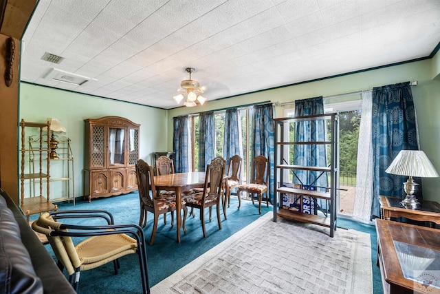 view of carpeted dining space