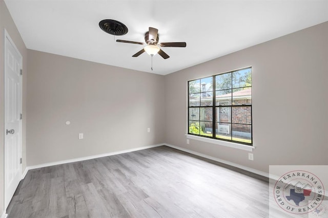 unfurnished bedroom featuring ceiling fan and light hardwood / wood-style flooring