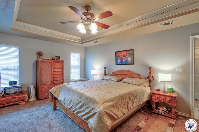 203 Peter Alan St, Wake Village, TX 75501 - bedroom with a tray ceiling, light carpet, crown molding, and ceiling fan
