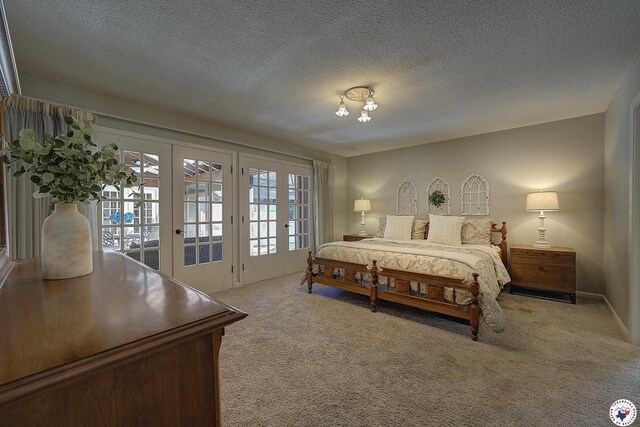 986 Texas Highway 77 W, Atlanta, TX 75551 - bedroom featuring french doors, access to outside, carpet floors, and a textured ceiling
