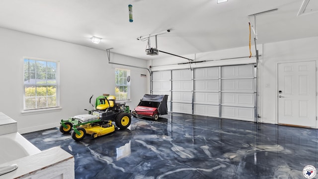 garage featuring baseboards and a garage door opener