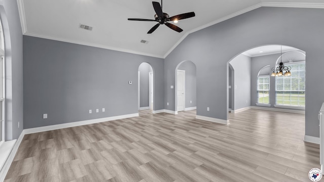 unfurnished living room featuring arched walkways, vaulted ceiling, visible vents, and ceiling fan with notable chandelier