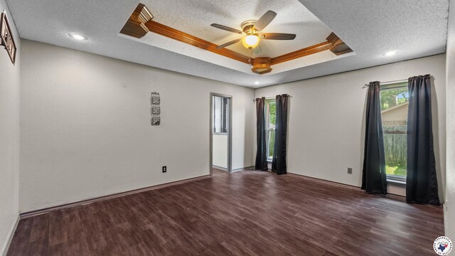 208 Jeffrey Ln, Wake Village, TX 75501 - spare room featuring a raised ceiling, a textured ceiling, wood finished floors, ceiling fan, and recessed lighting