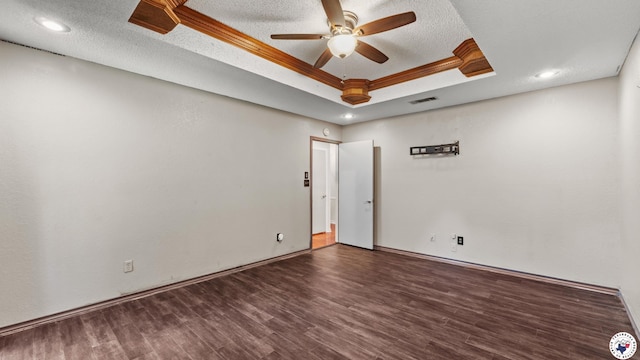208 Jeffrey Ln, Wake Village, TX 75501 - spare room with a raised ceiling, wood finished floors, ceiling fan, recessed lighting, and a textured ceiling