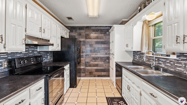 208 Jeffrey Ln, Wake Village, TX 75501 - kitchen featuring black appliances, under cabinet range hood, dark countertops, white cabinets, and a sink