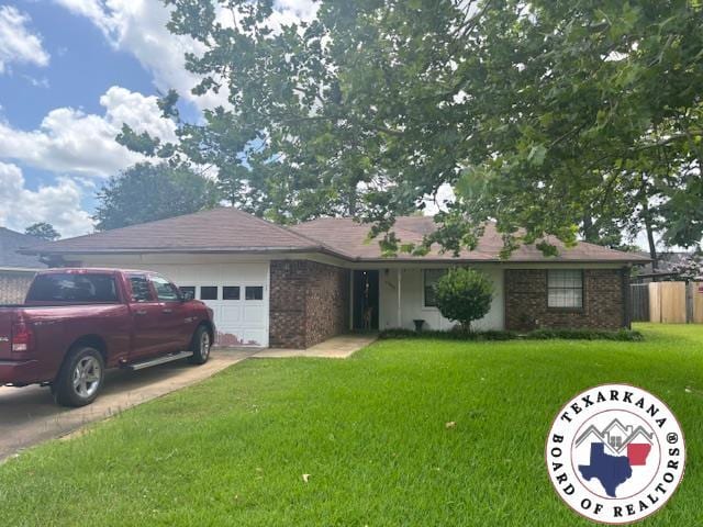 4903 Charleston St, Texarkana, AR 71854 - single story home with an attached garage, brick siding, and concrete driveway