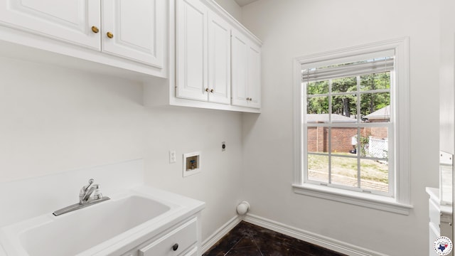 11 Dogwood Pl, Texarkana, TX 75503 - laundry area with hookup for an electric dryer, baseboards, washer hookup, cabinet space, and a sink