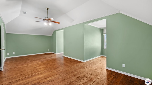 11 Dogwood Pl, Texarkana, TX 75503 - additional living space with ceiling fan, wood finished floors, vaulted ceiling, and baseboards
