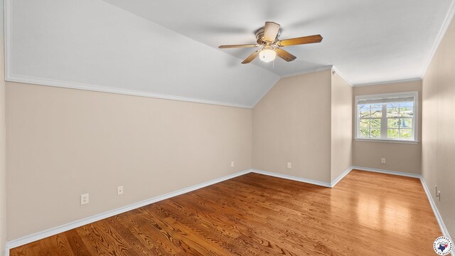 11 Dogwood Pl, Texarkana, TX 75503 - bonus room with vaulted ceiling, baseboards, a ceiling fan, and wood finished floors