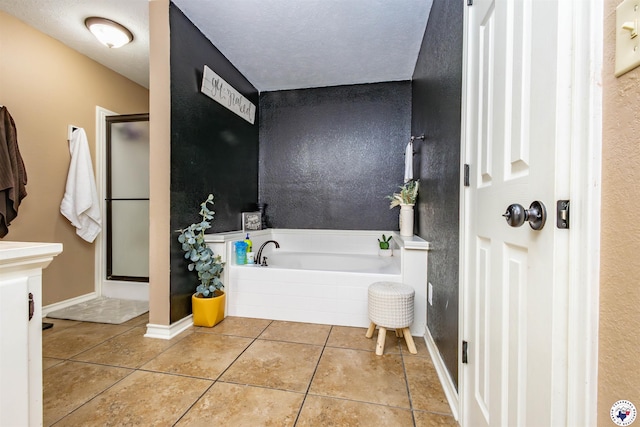 205 S Park Dr, New Boston, TX 75570 - bathroom with a stall shower, tile patterned floors, a bath, and baseboards