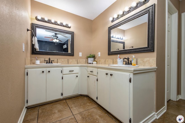 205 S Park Dr, New Boston, TX 75570 - bathroom with tile patterned flooring, double vanity, and a ceiling fan