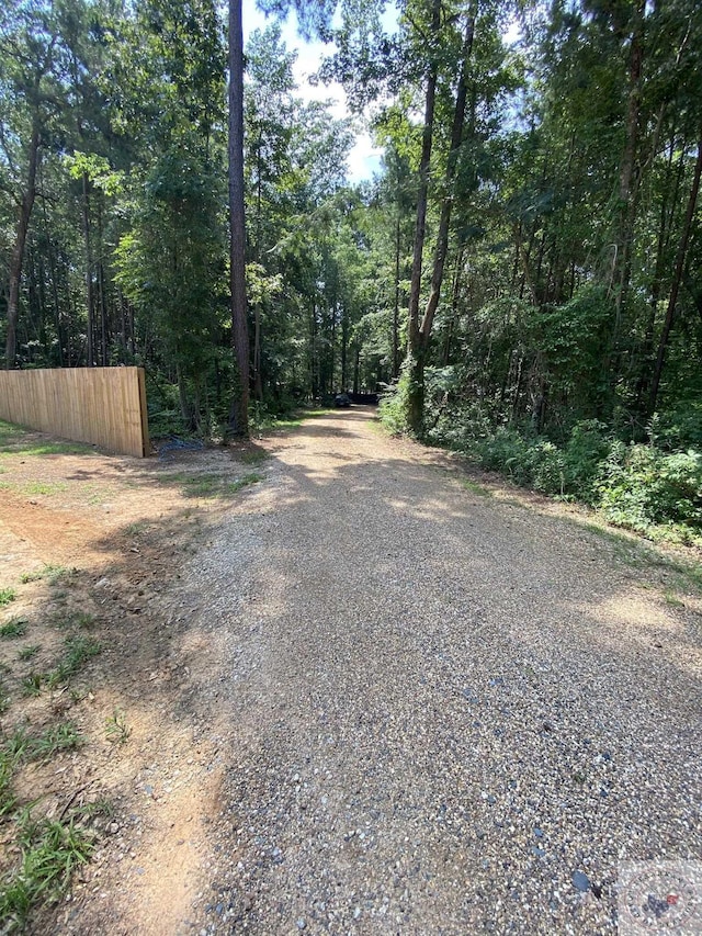 view of street with a wooded view