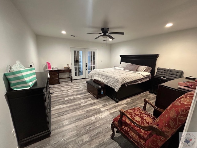 bedroom with ceiling fan, access to exterior, light hardwood / wood-style flooring, and french doors