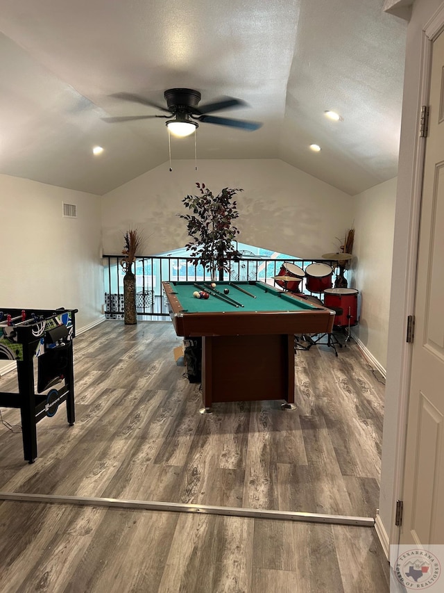 rec room featuring ceiling fan, a textured ceiling, pool table, dark wood-type flooring, and vaulted ceiling