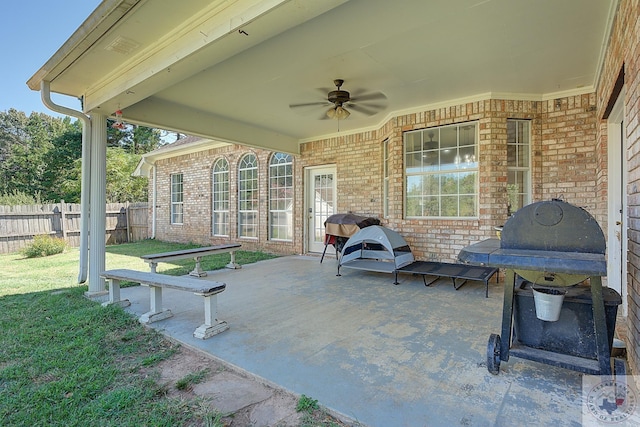 view of patio featuring a grill and ceiling fan