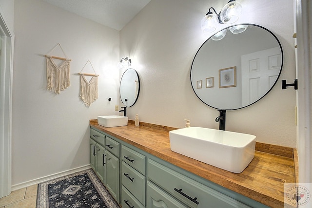 bathroom with vanity and tile patterned floors