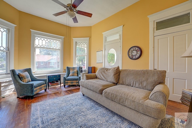 living room with hardwood / wood-style flooring, a wealth of natural light, and ceiling fan