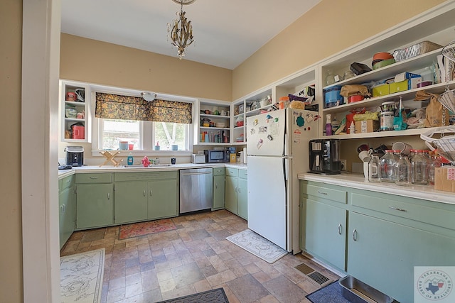 kitchen featuring sink, green cabinets, dishwasher, and white refrigerator