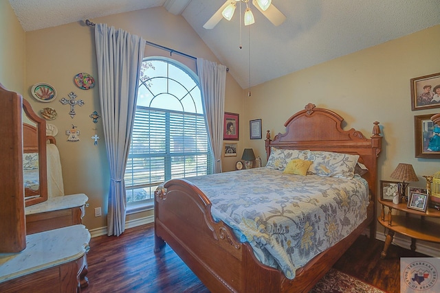 bedroom featuring ceiling fan, dark hardwood / wood-style floors, and vaulted ceiling