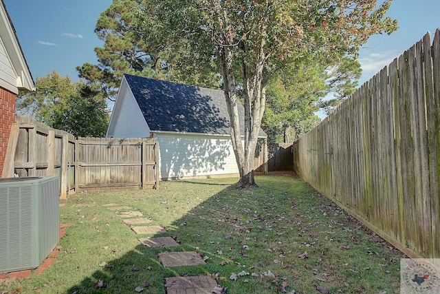 view of yard featuring central air condition unit