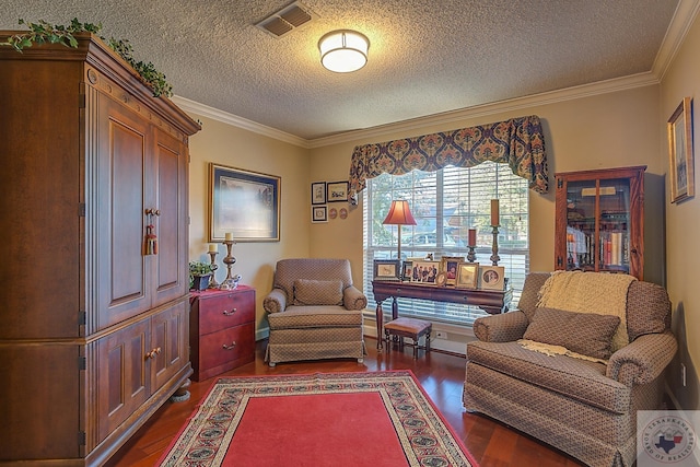 sitting room with ornamental molding, a textured ceiling, and dark hardwood / wood-style flooring