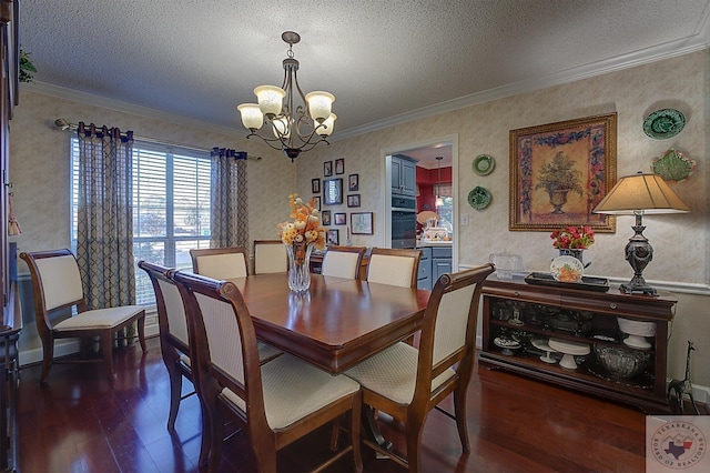 dining space featuring a textured ceiling, dark hardwood / wood-style flooring, crown molding, and a notable chandelier