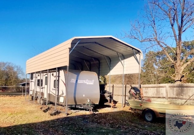 view of outdoor structure with a carport