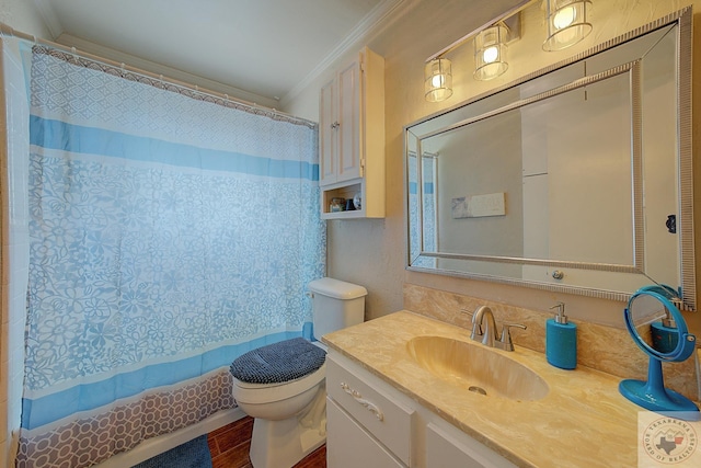 bathroom featuring toilet, vanity, ornamental molding, and a shower with shower curtain