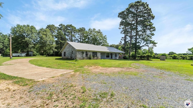 1599 Myrtle Springs Rd, Texarkana, TX 75503 - view of front of home featuring a front lawn and metal roof